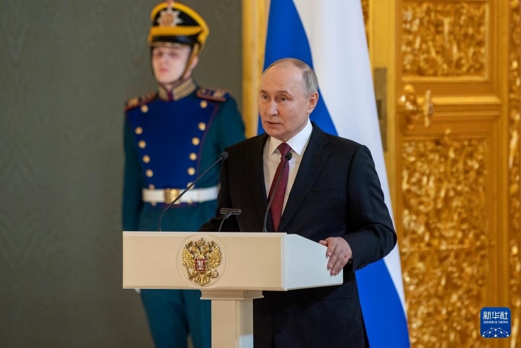 3月20日，俄羅斯總統(tǒng)普京在莫斯科克里姆林宮與其競選團(tuán)隊代表舉行見面會。新華社記者 曹陽 攝