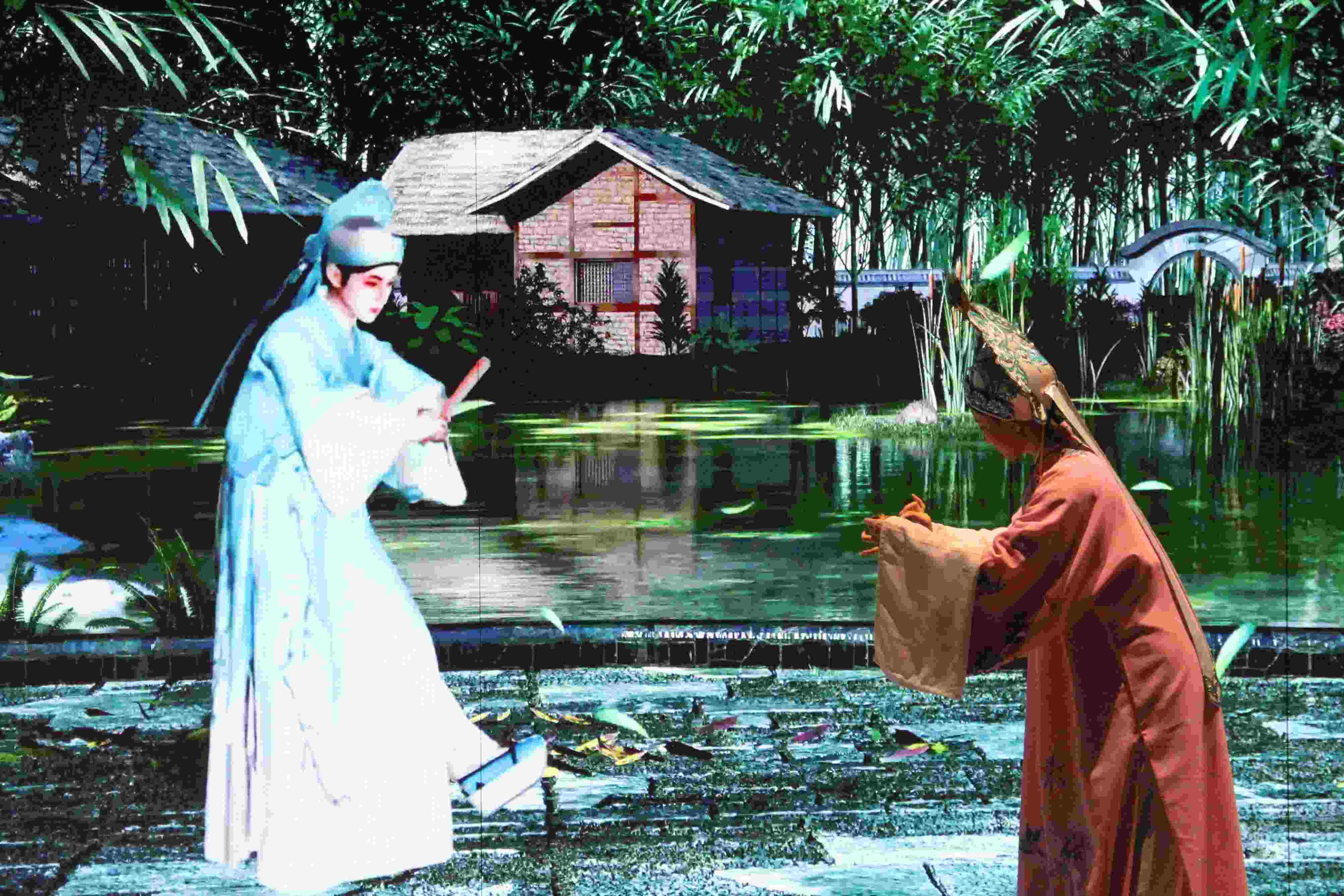 真人演員與虛擬人演員在“元啟金陵”南京數(shù)字文化客廳出演《梁山伯與祝英臺》經(jīng)典選段。受訪者供圖