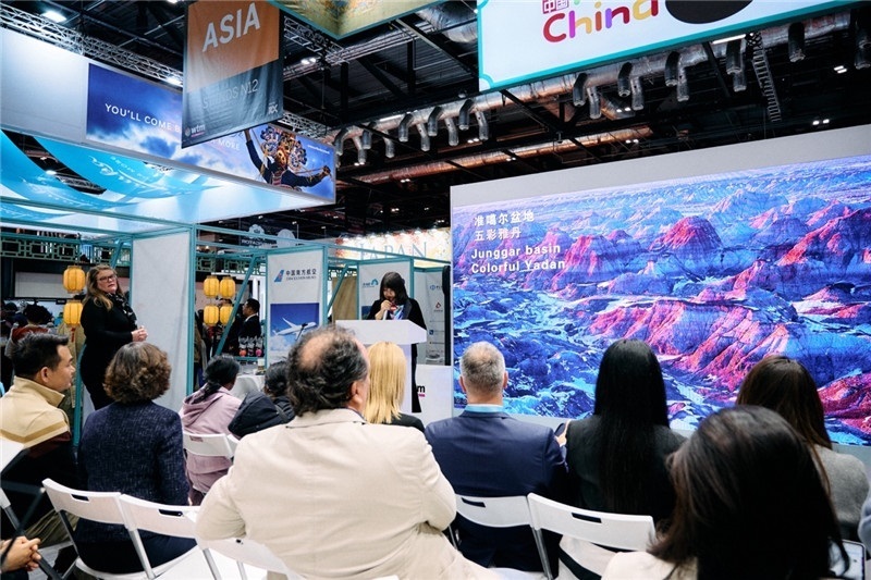  “中國館”新疆旅游推介會現(xiàn)場介紹。楊浩鵬攝